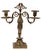 Pair of candelabra is a couple of original two lights candelabra shaped as caryatid female body in gilded bronze. Realized...
