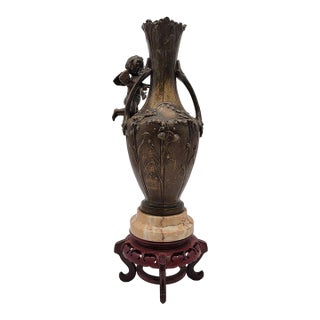 19th Century French Metal Cupid Vase For Sale