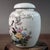 Add a touch of serene elegance to your home with this charming small porcelain jar. Featuring a classic rounded shape with...