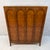 Striking mid-century modern highboy dresser by Thomasville, featuring a sculptural silhouette, rich walnut finish, and...