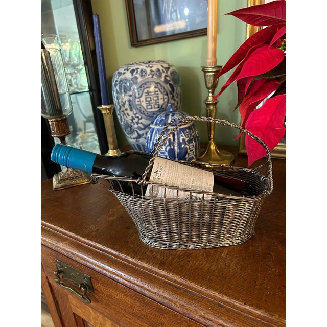 Dress up your table or bar cart with this vintage silver plate wine bottle caddy. So popular in the 1960’s and 1970’s,...