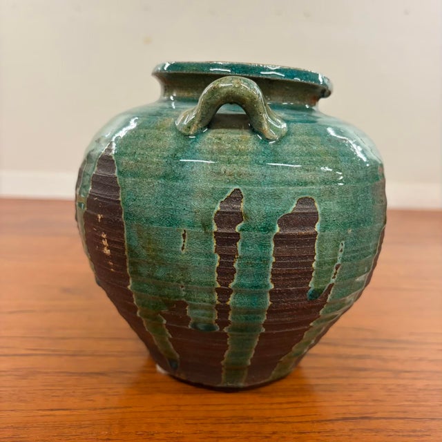 A beautifully handcrafted vintage studio pottery vessel inspired by traditional Japanese Oribe ceramics. This sculptural...