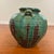 A beautifully handcrafted vintage studio pottery vessel inspired by traditional Japanese Oribe ceramics. This sculptural...