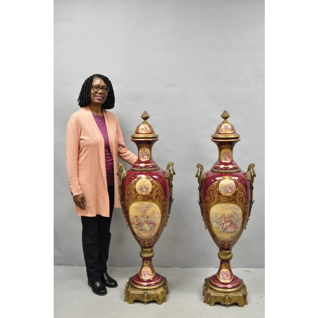 Vintage 56" Large Palace Size French Sevres Style Red Porcelain Revolving Covered Urns - a Pair. Item features revolving...
