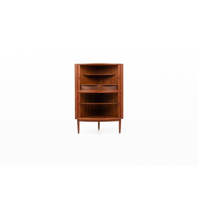 Danish vintage corner cabinet with a bar area. The cabinet was designed by johannes andersen and produced in denmark in...