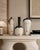 Vintage set of three postmodern figural ceramic vases featuring Art Nouveau-inspired faces, flowing raised glaze details,...