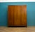A freestanding solid superior quality Danish three door teak wardrobe, made during the 1960s. Fitted out with a satin...