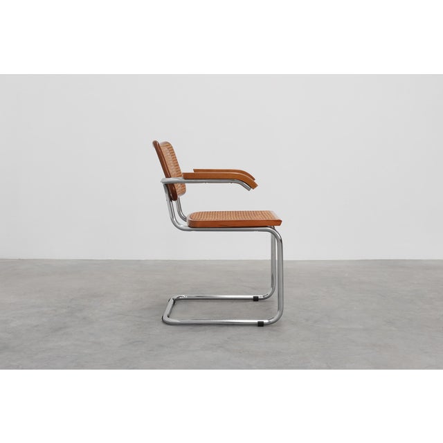 Italy / 1930 / chair / Tubular Steel, wood and Rattan / Bauhaus This chair features the classic cantilevered chrome-plated...