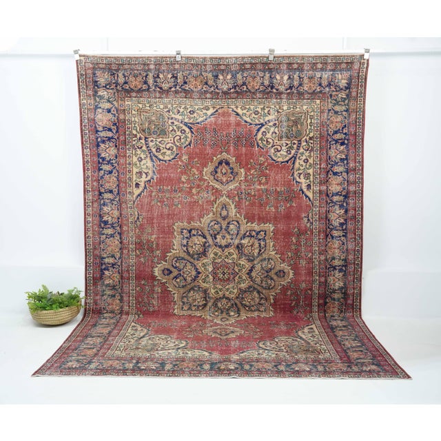 Vintage Turkish Hand-Knotted vintage rug is a semi-antique vintage Area rug.'70s Eastern region of Turkey's unique rug is...