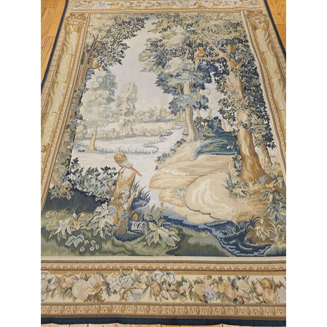 A beautifully hand-woven French Aubusson tapestry in the celebrated Verdure style — the tradition of representing lush...
