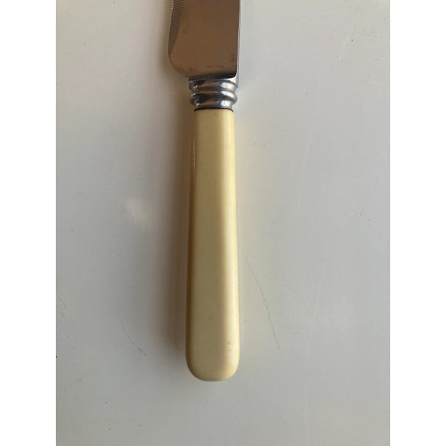 Vintage bone handle with stainless steel blade carving knife14"L , makers mark reads "Sheffield England" Very good condition.