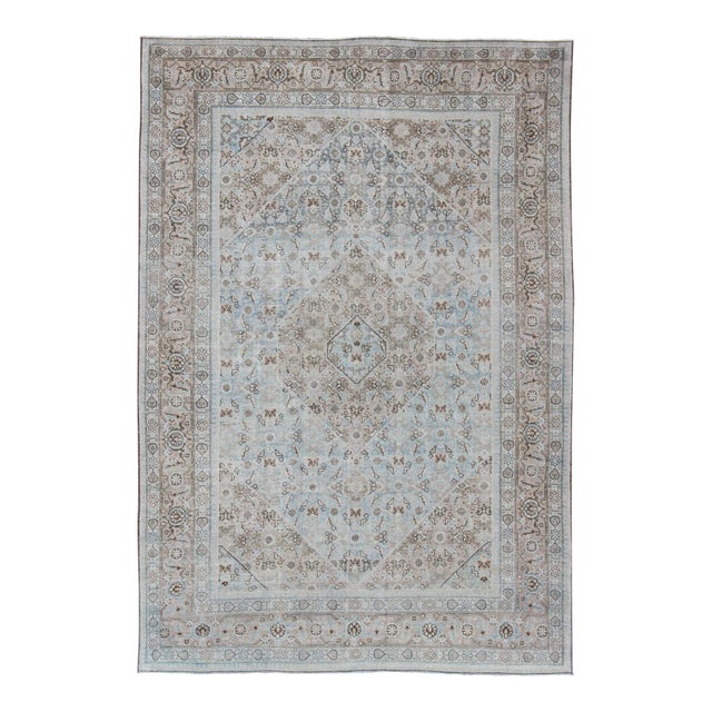 Early 20th Century Persian Antique Tabriz Rug With Medallion With Herati Design and Muted Colors 7'11 X 11'4 For Sale