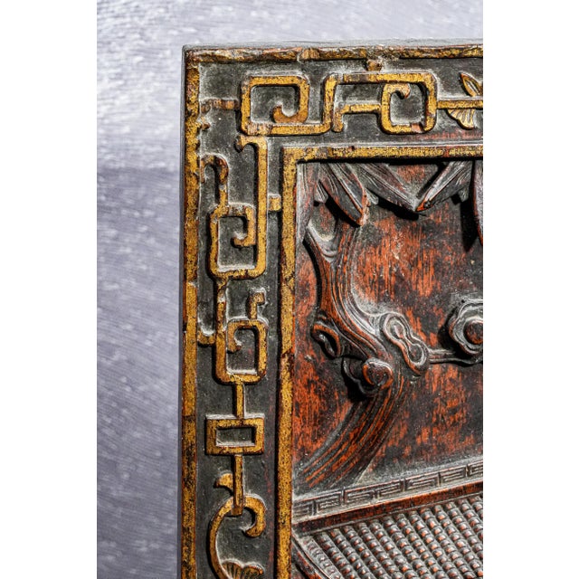 This antique 19th Century Chinese wood table screen is a captivating example of traditional Chinese craftsmanship, adorned...