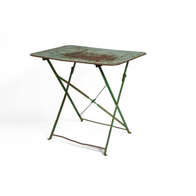 French Painted Wrought Iron Folding Garden Table, circa 1920's. Green painted weathered surface.