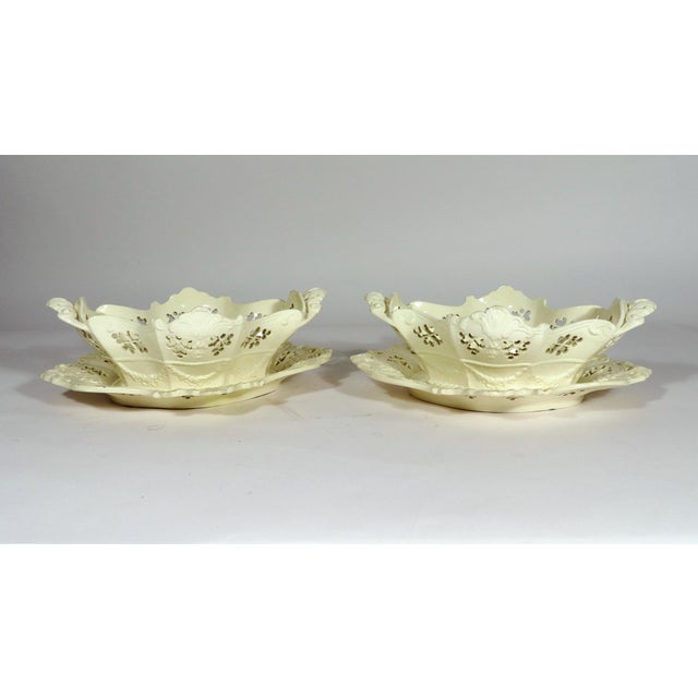 English Creamware Rococo Fruit Baskets and Stands, Pair, Pierced and Shell-Molded, Staffordshire or Yorkshire Circa...