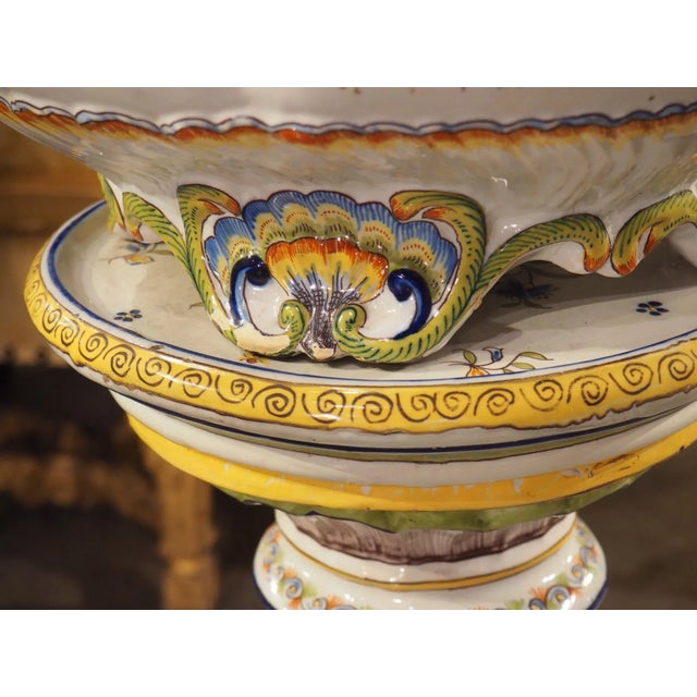 This fantastic faience jardiniere and pedestal were hand-painted in Boulogne, France (formally “Boulogne-sur-Mer”) in the...