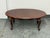 Design Plus Gallery presents the Queen Anne Style Coffee Table from The Bombay Company. An oval wood top, shaped edge, and...