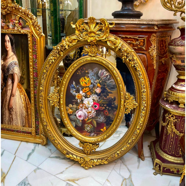 Make a striking statement with this exquisite French Rococo–inspired oval artwork, featuring a beautifully detailed floral...