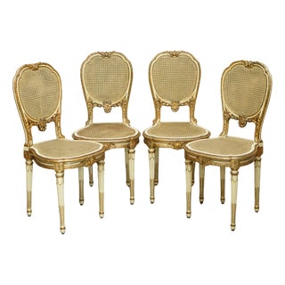 French Louis XVI Carved Giltwood and Cane Bergere Side Chairs, Set of 4 For Sale