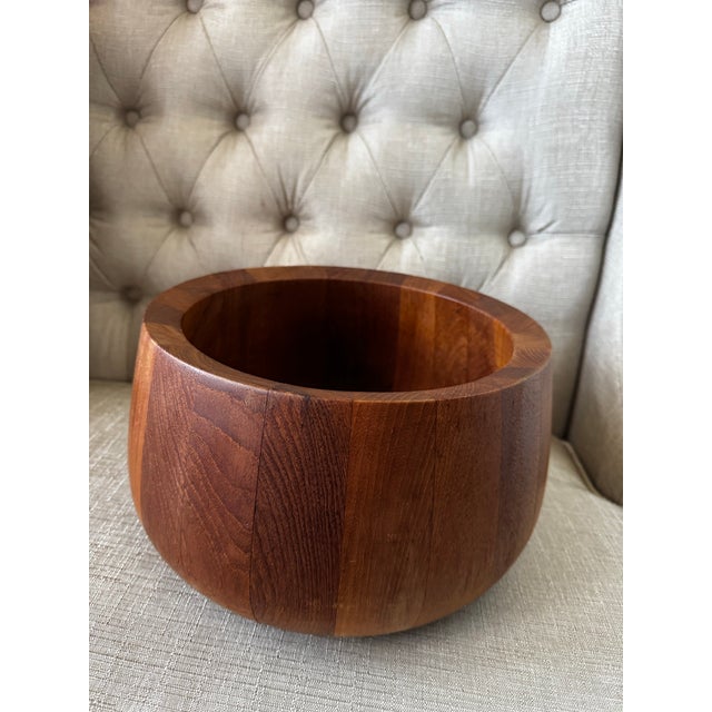 Beautiful vintage Dansk teak wood bowl, crafted in Malaisia and marked Dansk International Design Ltd. This piece features...
