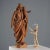 Terracotta sculpture depicting the Virgin Mary and Child. This piece is attributed to the mentioned designer/maker. It has...