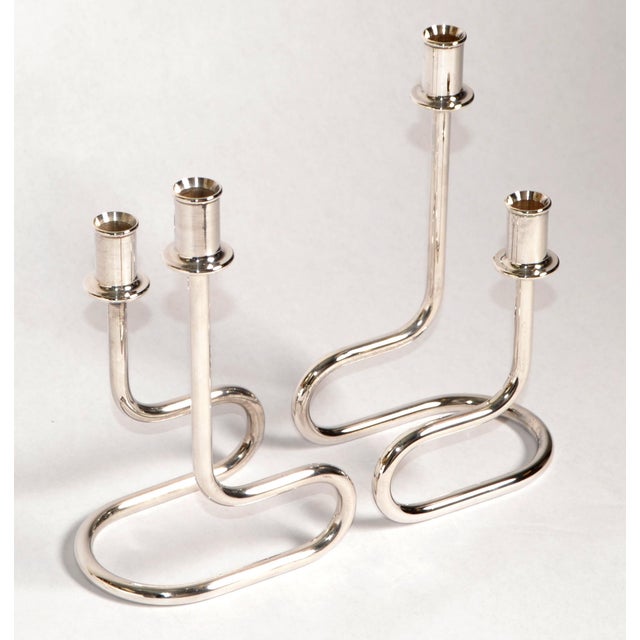 The Gorham Maestri Italian candle holders are mid-century modernist silver-plated candlesticks from circa 1950, featuring...