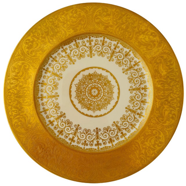 Set of twelve service dinner porcelain plates by Heinrich & Co Selb Bavaria featuring a 22K gold encrusted filigree and...