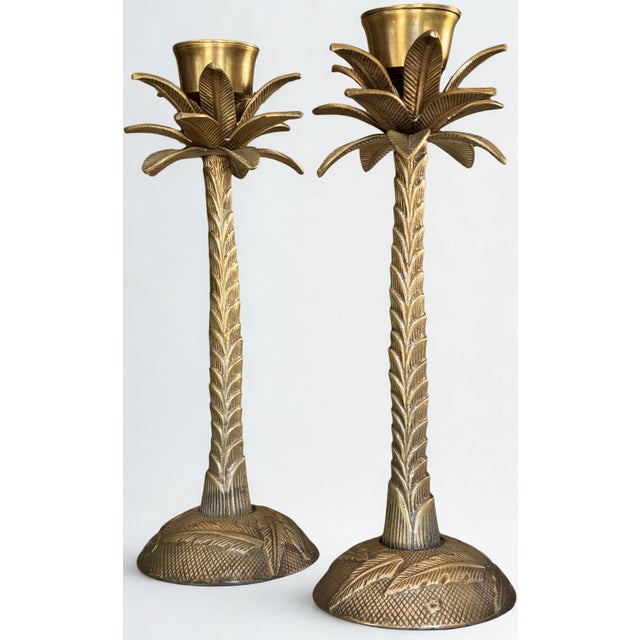 These are solid brass, heavy for their size, luxurious British Colonial style candle sticks. A domed circular base is...