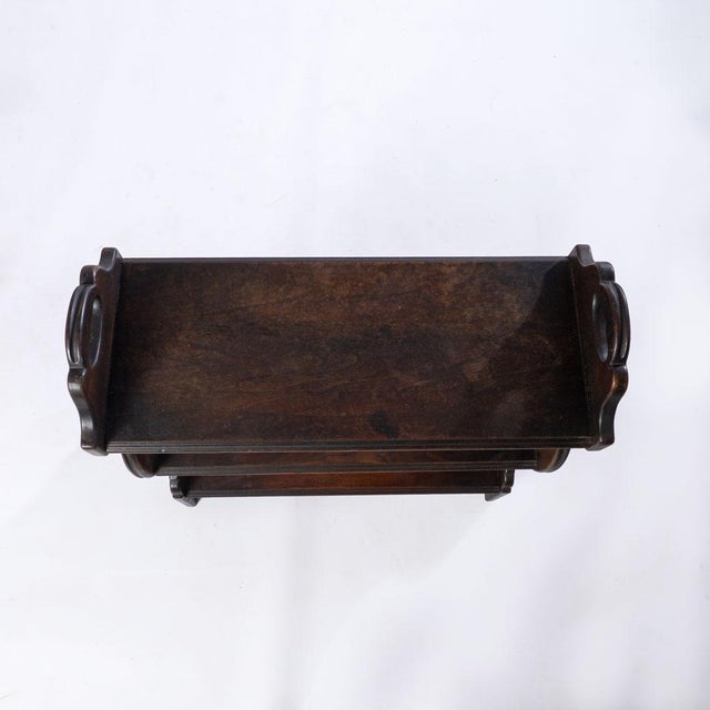 Kittinger stand with three shelves and handles. This piece is multifunctional and could work as a side table, storage,...