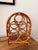 A handcrafted bamboo and rattan wine rack from the '70s. Holds 5 bottles and perfect for your boho beachy abode.