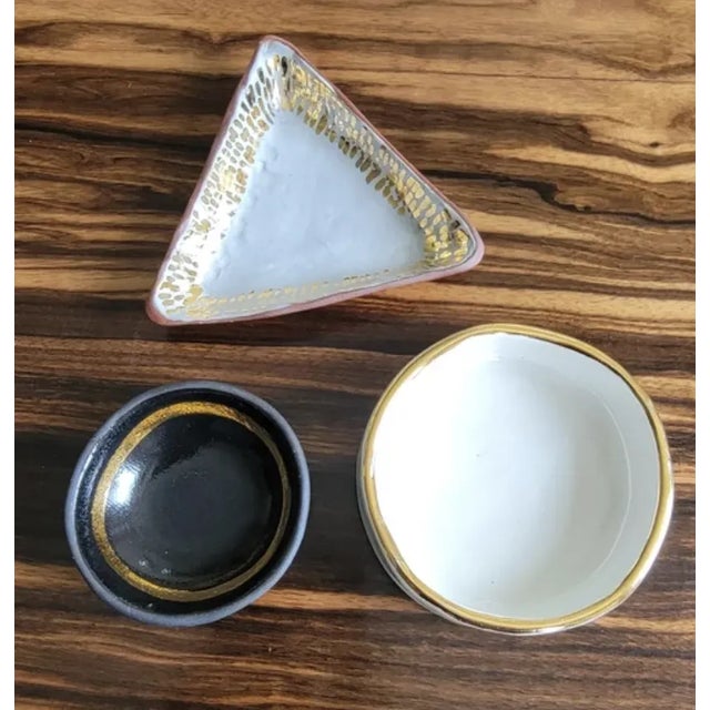 set of 4 porcelain ceramic bowls/dishes handmade by artist 'the object enthusiast'. +Black + Gold Tround Trinket Dish:...