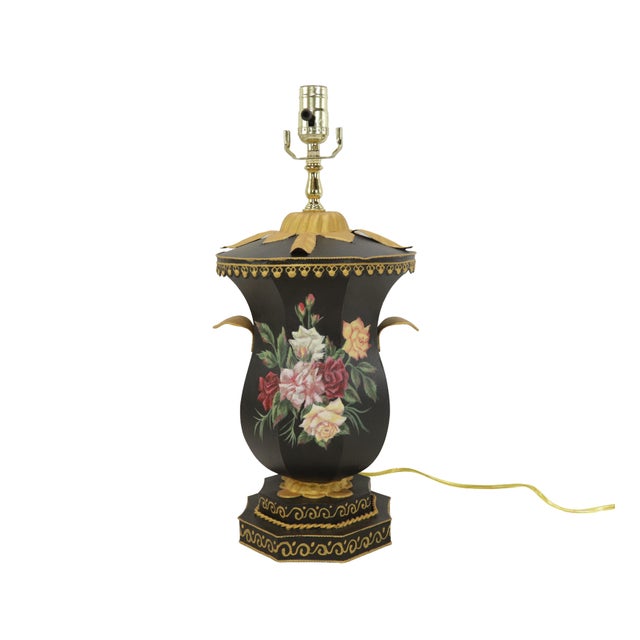 A vintage handcrafted wrought iron table lamp in the style of Chelsea House. The black handcrafted wrought iron body...