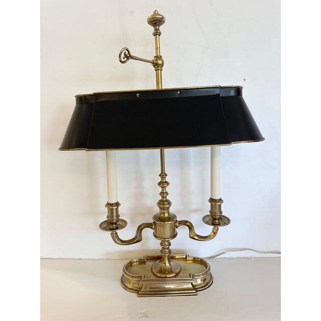 Frederick Cooper solid brass bouillotte lamp having 2 arms and handsome black shade.