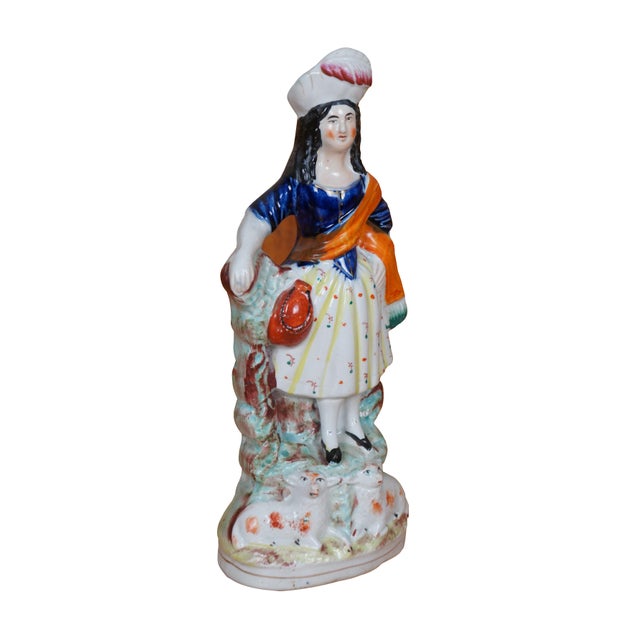 Antique 19th century Staffordshire porcelain flatback figurine depicting a s Scottish shepherdess in feathered hat, cobalt...