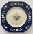 These are are a set of four vintage, pre-owned 8 1/2” by 8 1/2” plates. Beautiful blue and white with floral in the center...