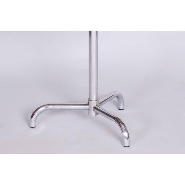 Model H-109 Designed by Jindrich Halabala, a renowned designer credited with ushering in the mass market production of...