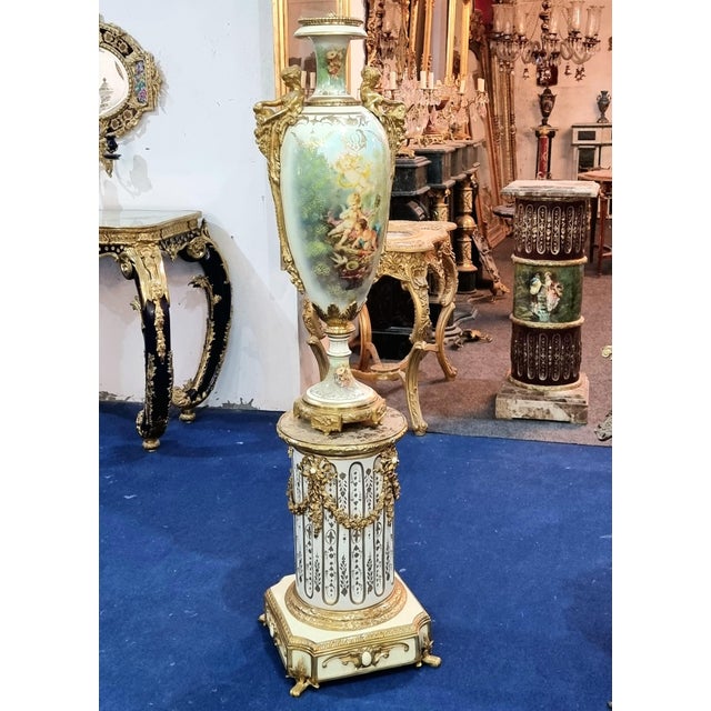 Bring timeless European elegance to your interior with this exquisite decorative ensemble, featuring a graceful white...