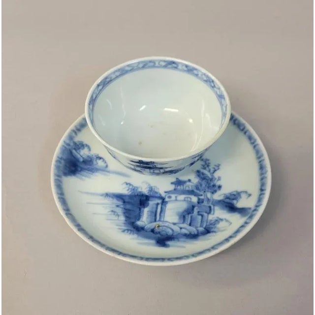 Circa 1750 Chinese export Nanking Cargo blue and white porcelain tea bowl and saucer. The cup and saucer were recovered...