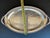 The Vintage Oneida Oval Serving Tray is a classic and elegant piece of metalware that exudes sophistication. Made from...