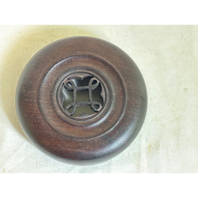 Cap off your favorite vase or jar with this lovely carved wood jar lid.