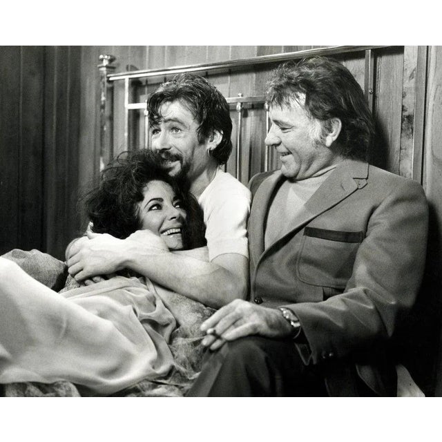 "Under Milk Wood" by Keith Hamshere Richard Burton (1925 - 1984) surprises co-stars Elizabeth Taylor and Peter O'Toole by...
