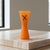 This striking vintage studio art glass vase features a satin-frosted translucent orange body. Accented with applied...