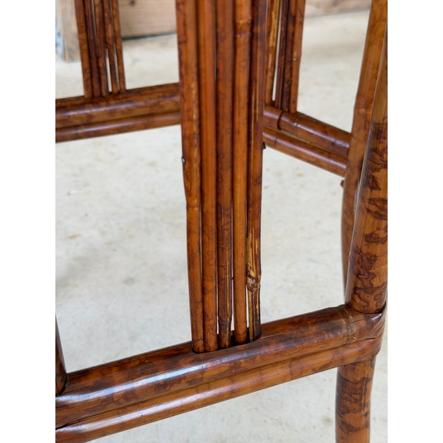 A beautifully refinished vintage Chinoiserie pedestal plant stand showcasing an elegant hexagonal form, richly grained...