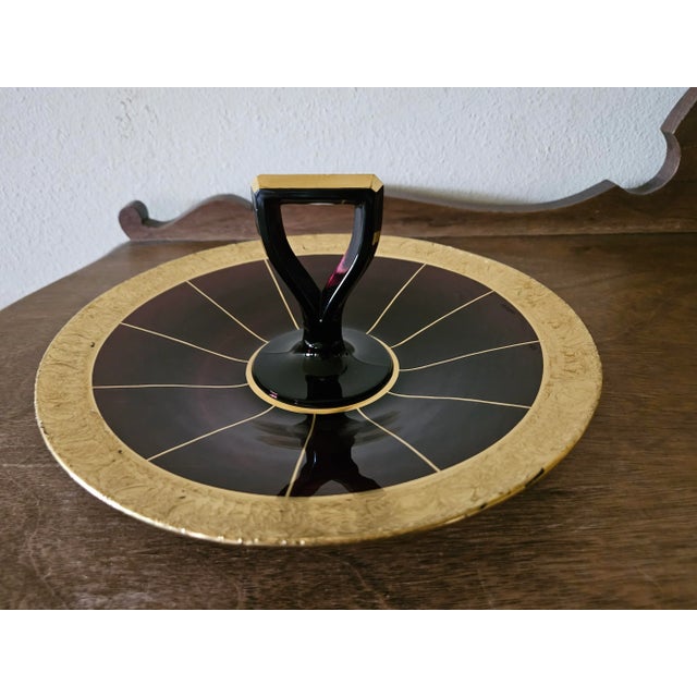 Vintage deep violet glass tray with gold accent and trim. This would make a perfect table centerpiece. There is minor wear...