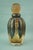 Item : Delightful, wide-ribbed bottle in Murano blown sommerso pulegoso glass, crafted by joining amber glass on the...