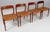 Set of four n. O. Møller dining chairs with frame of solid teak. Seats new upholstered with tan aniline leather model 75,...