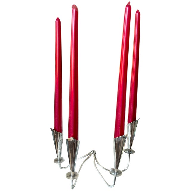 A sculptural Danish modern silverplate candelabra by Hans Jensen, Denmark, designed in the elegant “Lily” form. Four...