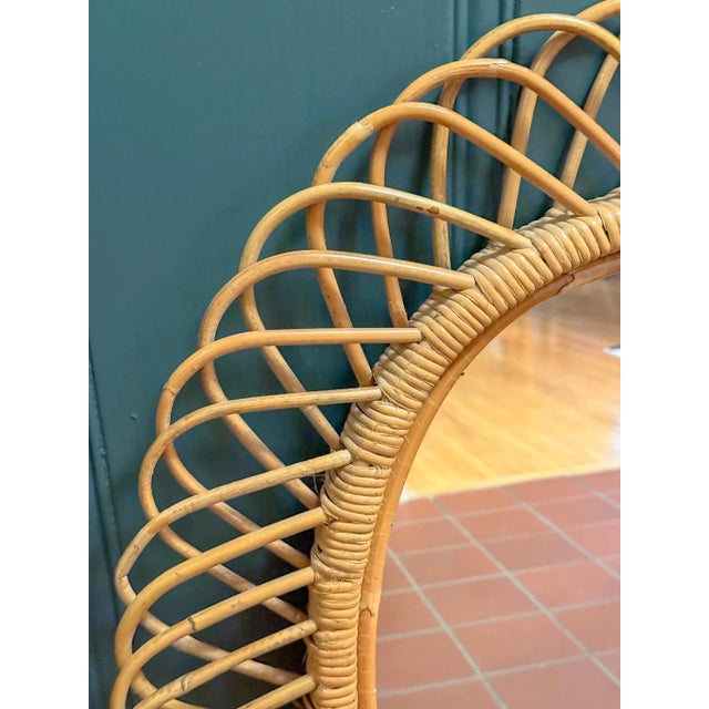 Incredible Pair of Italian wicker rattan wall mirrors by the designer Franco Albini, by Rosenthal-Netter, circa mid-20th...