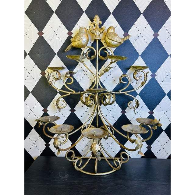 Grand pair of vintage gilt-metal candelabras with an exuberant composition of sculptural birds, scrolling branches,...