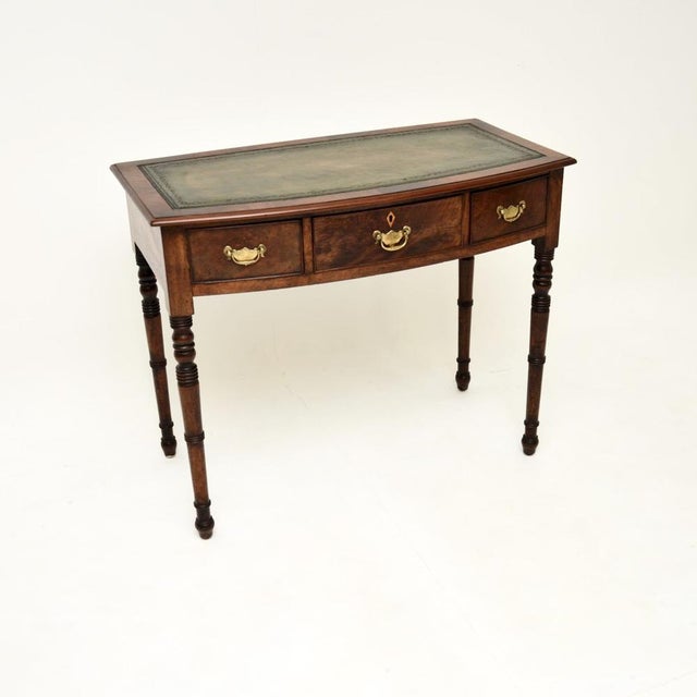 A wonderful antique Georgian writing table / desk. It was made in England, it dates from around the 1800-1820 period. It...